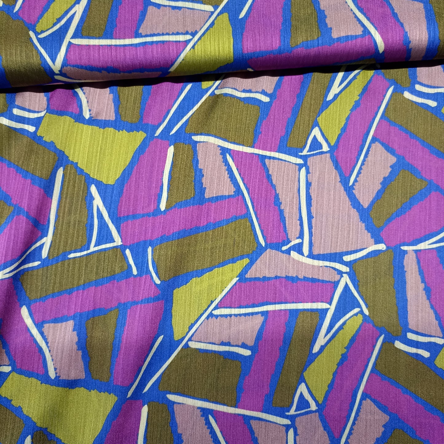 Polyester grafische print op koningsblauwe achtergrond