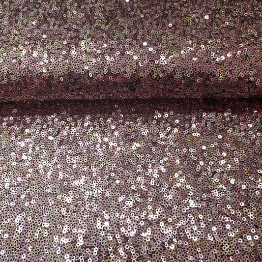 pailletten oudroze op zwarte mesh achtergrond